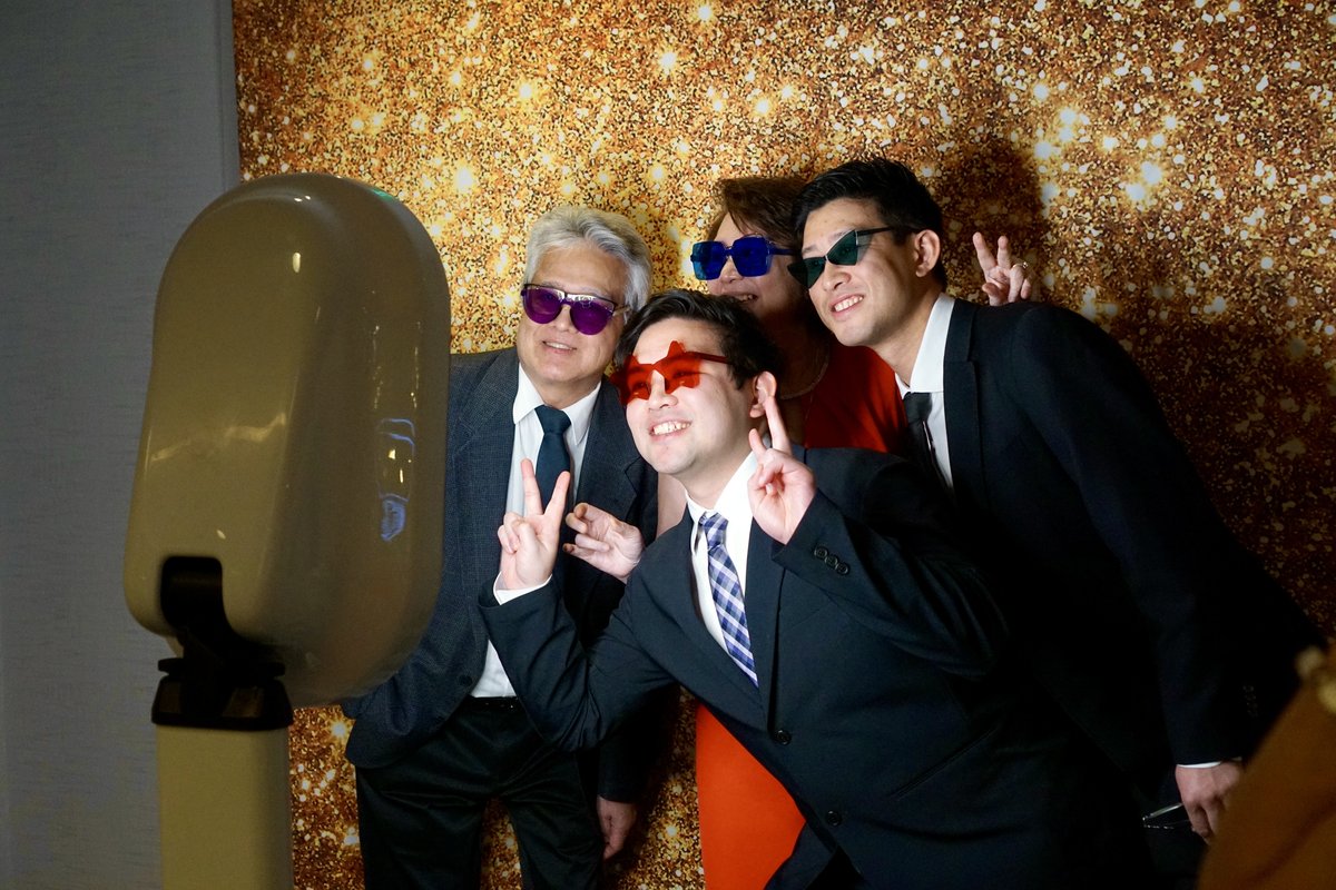 Guests having fun at a Penguin Photobooths event